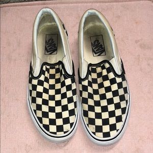 checkerboard black slip on vans